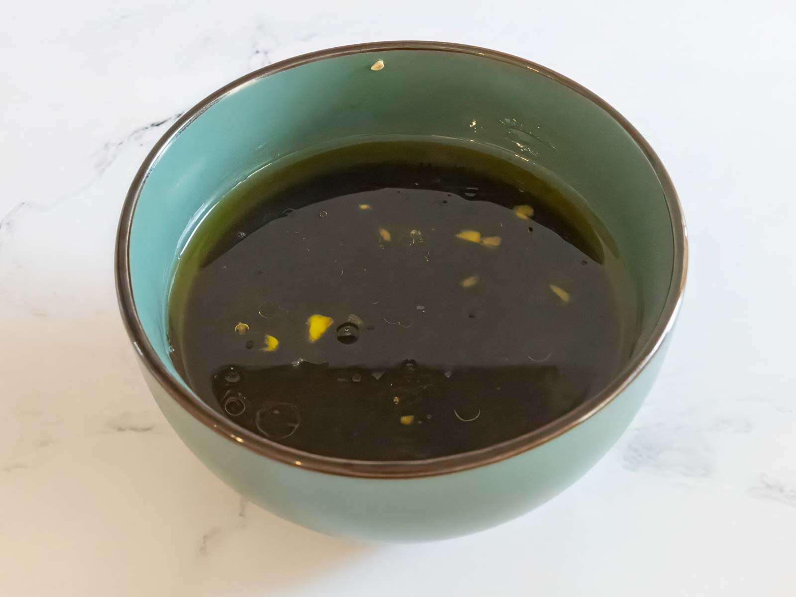 Prepared marinade in a small bowl