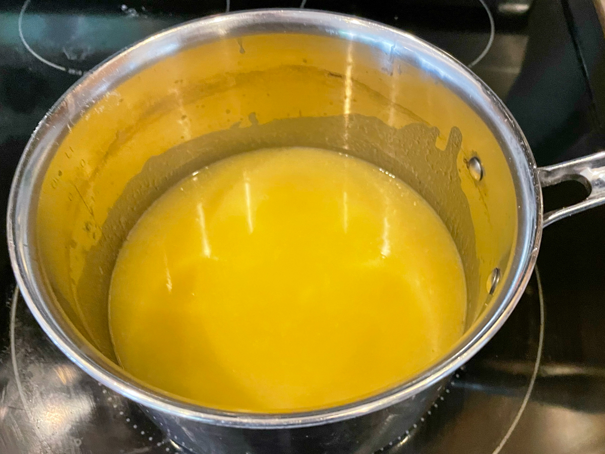 Enchilada sauce in pan on stovetop