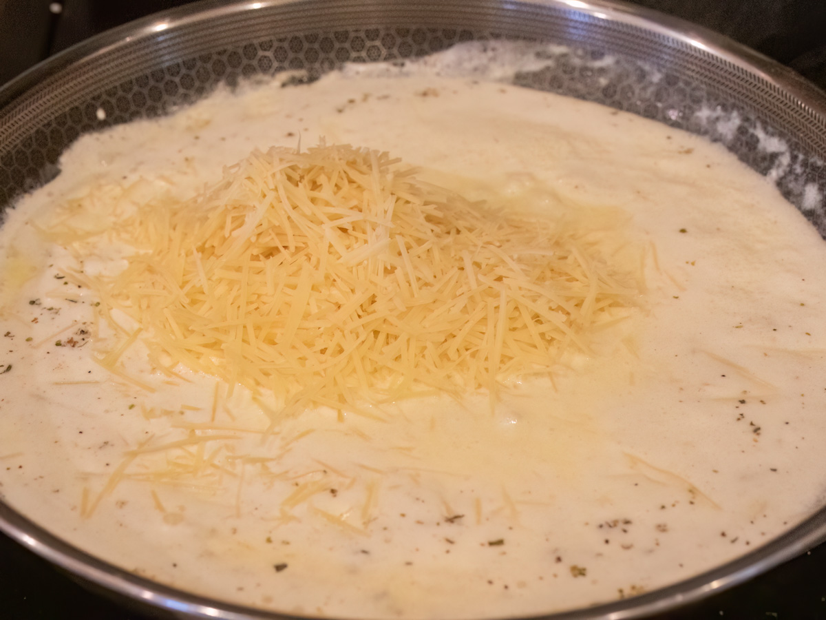 alfredo sauce being prepared