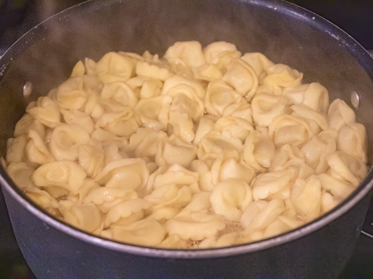 tortellini cooking in a pot