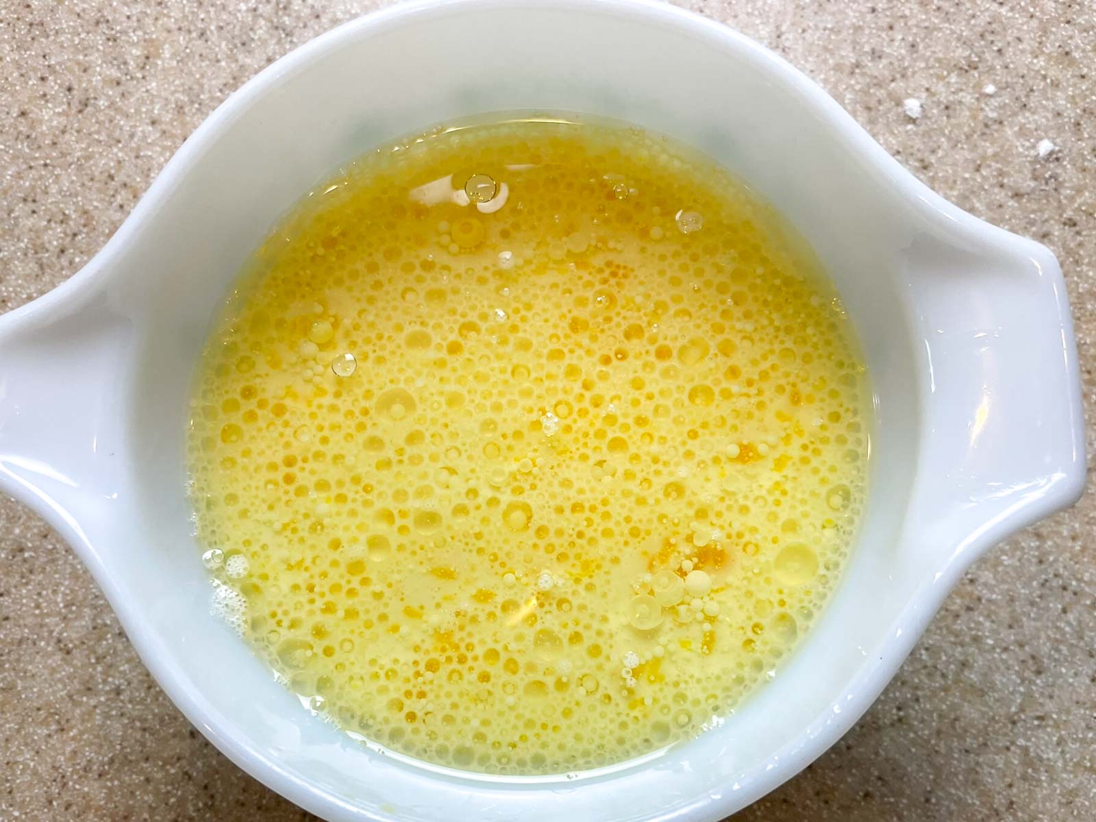 Pancake wet ingredients in a mixing bowl