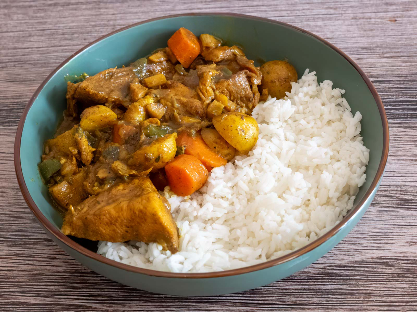 Jamaican Jerk Chicken with rice in a bowl